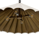 Textures and contrasting hues unite for this pendant's beautiful glow. The overscale scalloped shade features a creamy white canvas exterior covering a dark, antiqued brass interior, and a wrought iron chain for maximum drama Amethyst Home provides interior design, new home construction design consulting, vintage area rugs, and lighting in the Washington metro area.
