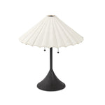Textures and contrasting hues unite for this table lamp's beautiful glow. The overscale scalloped shade features a creamy white canvas exterior covering an antiqued brass interior, and wrought iron pull chains adjust each lightbulb in Baroque-era form Amethyst Home provides interior design, new home construction design consulting, vintage area rugs, and lighting in the Scottsdale metro area.