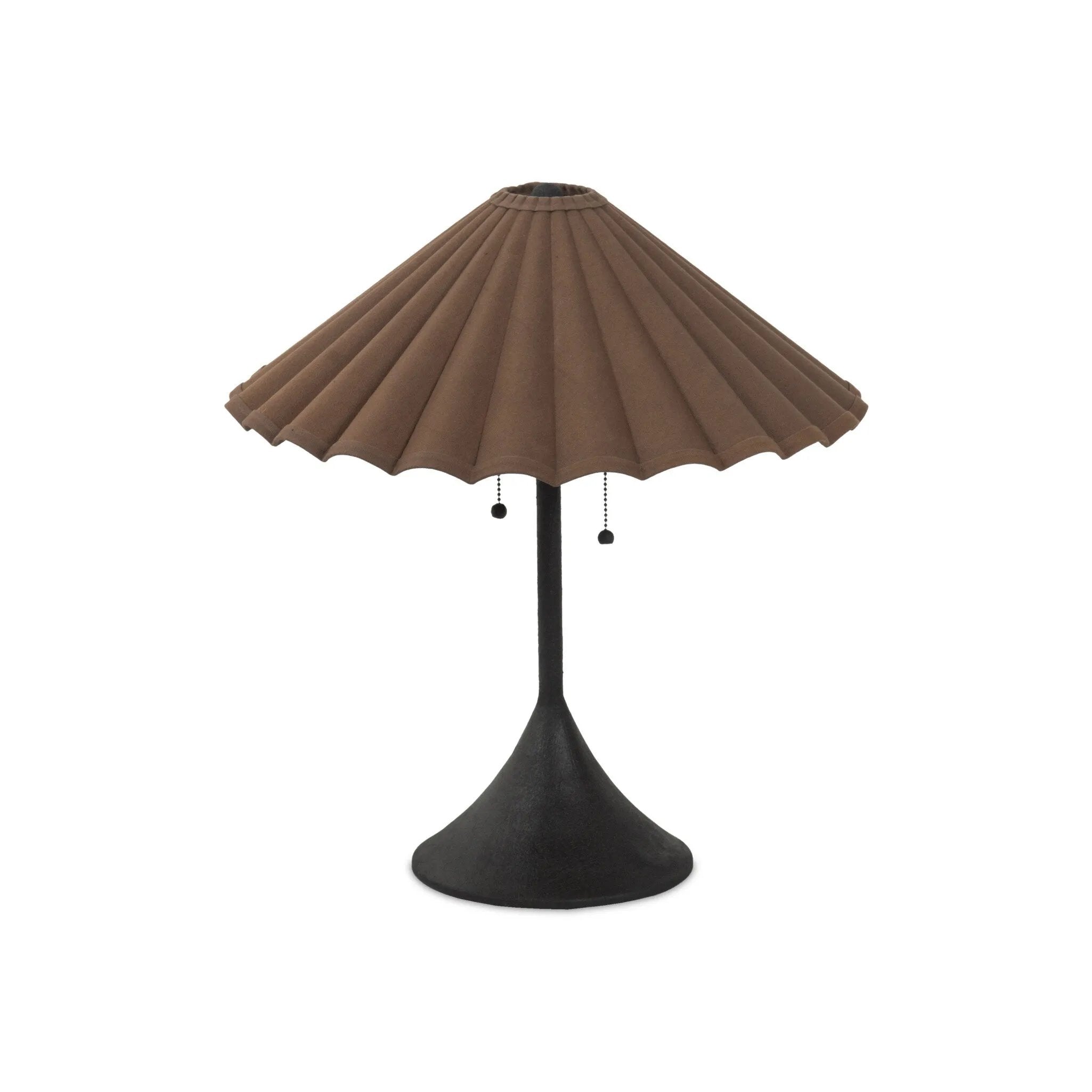 Textures and deep hues unite for this table lamp's beautiful glow. The overscale scalloped shade features a dark canvas exterior covering an antiqued brass interior, and wrought iron pull chains adjust each lightbulb in Baroque-era form Amethyst Home provides interior design, new home construction design consulting, vintage area rugs, and lighting in the Dallas metro area.