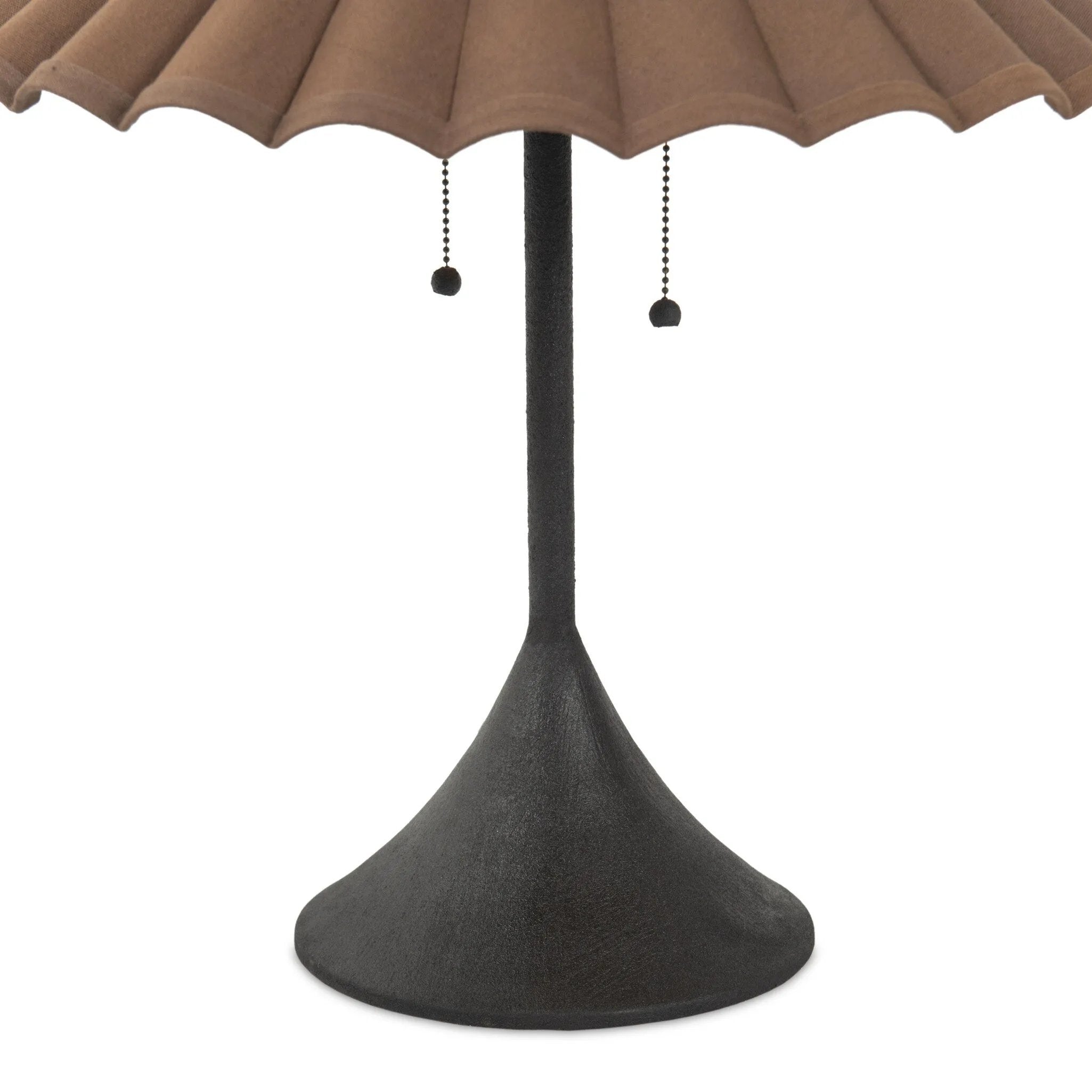 Textures and deep hues unite for this table lamp's beautiful glow. The overscale scalloped shade features a dark canvas exterior covering an antiqued brass interior, and wrought iron pull chains adjust each lightbulb in Baroque-era form Amethyst Home provides interior design, new home construction design consulting, vintage area rugs, and lighting in the Scottsdale metro area.