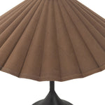 Textures and deep hues unite for this table lamp's beautiful glow. The overscale scalloped shade features a dark canvas exterior covering an antiqued brass interior, and wrought iron pull chains adjust each lightbulb in Baroque-era form Amethyst Home provides interior design, new home construction design consulting, vintage area rugs, and lighting in the Washington metro area.
