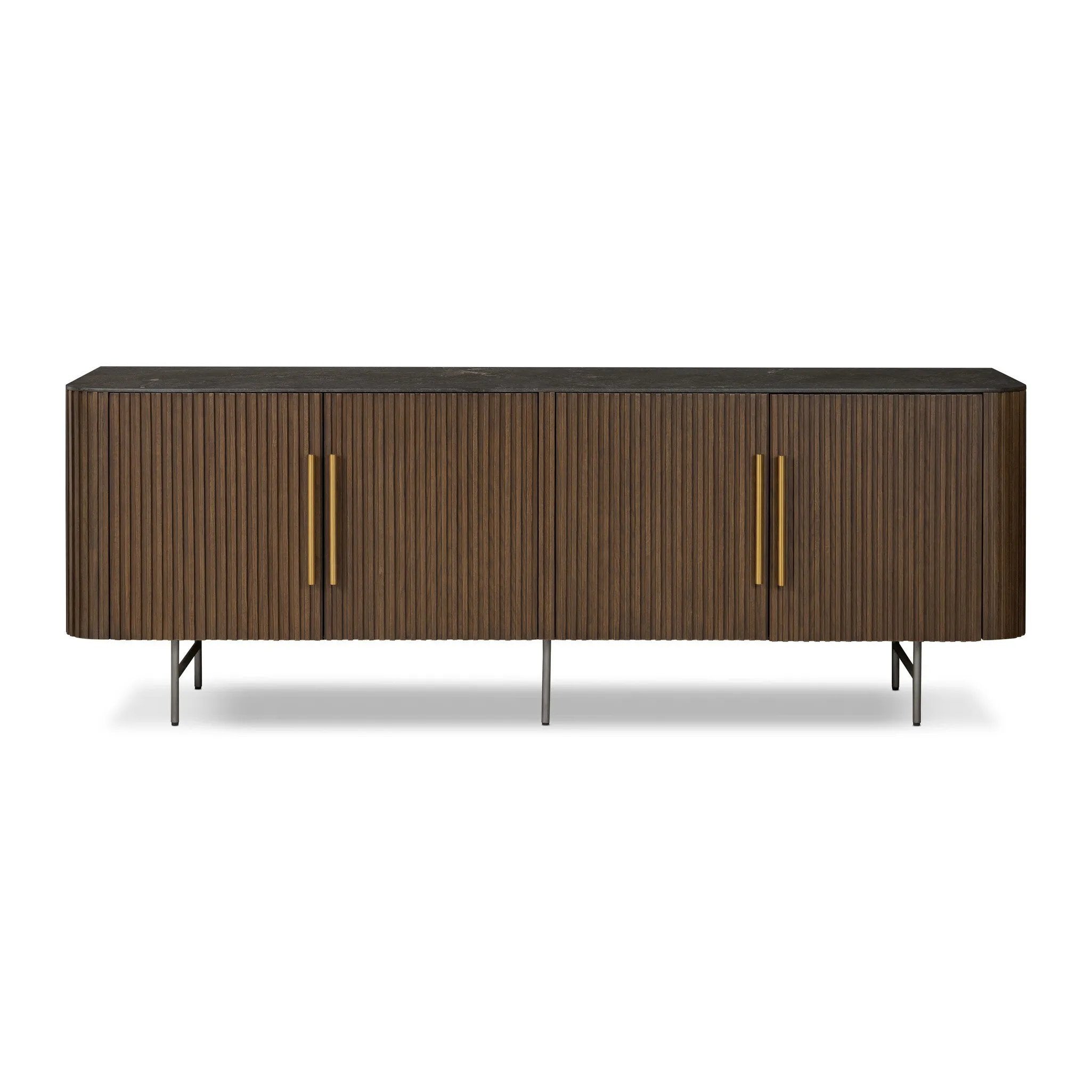 Rich with reeding for texture and a linear look, this brown oak media console features four doors with brushed brass hardware and curved corners. Its top is a slab of bluestone, adding a striking material mix, while white mineral lines and natural variations mark the uniqueness of each piece.Collection: Collin Amethyst Home provides interior design, new home construction design consulting, vintage area rugs, and lighting in the Park City metro area.