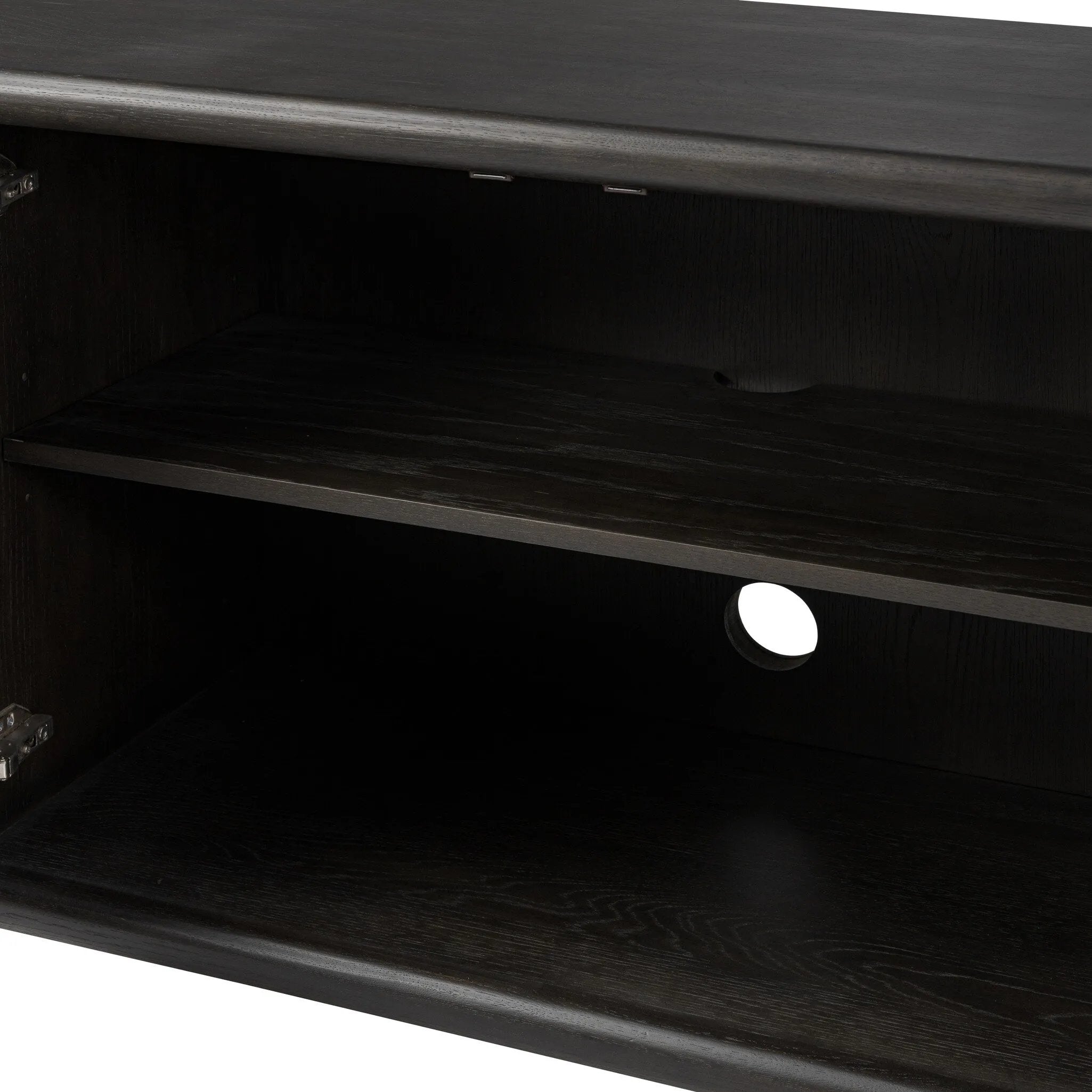 Large cylinder framework defines this oak sideboard with a warm oak finish. Curved lines add softness, while delicate hardwar