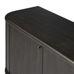 Large cylinder framework defines this oak sideboard with a warm oak finish. Curved lines add softness, while delicate hardwar