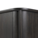Large cylinder framework defines this oak sideboard with a warm oak finish. Curved lines add softness, while delicate hardwar