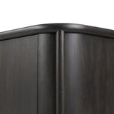 Large cylinder framework defines this oak sideboard with a warm oak finish. Curved lines add softness, while delicate hardwar