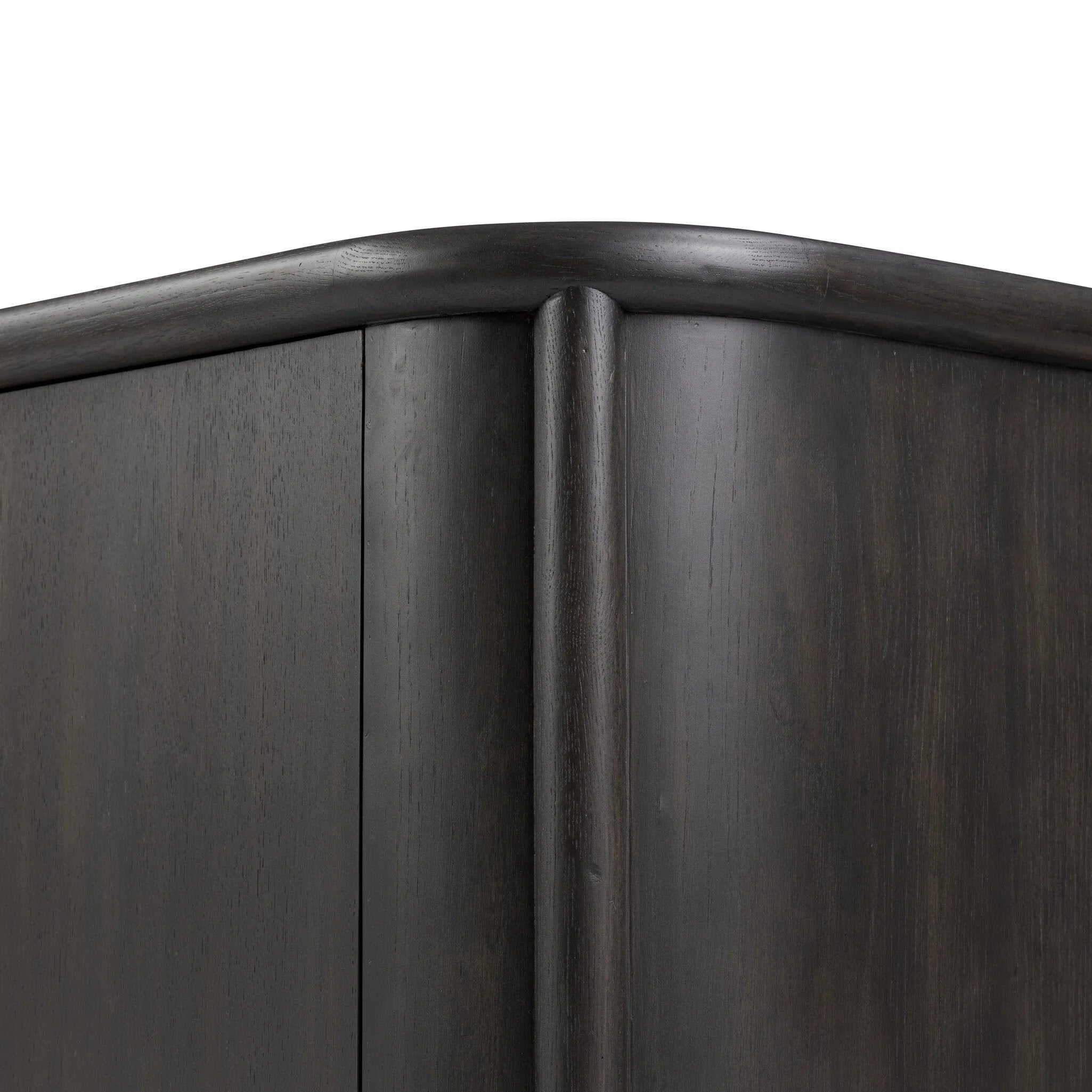 Large cylinder framework defines this oak sideboard with a warm oak finish. Curved lines add softness, while delicate hardwar