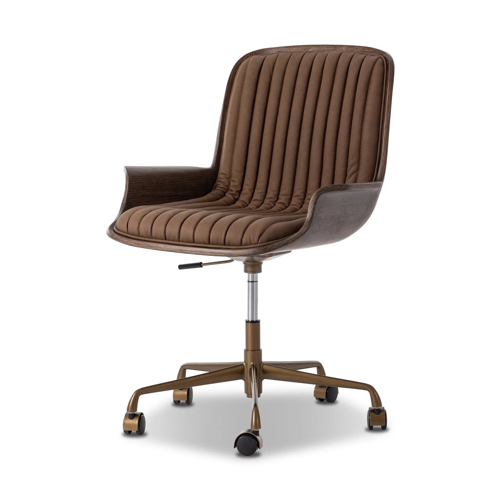 Elevate the office with one easy piece. Inspired by midcentury molded plywood chairs, brown oak veneer frames top-grain leather seat cushioning with slim, soft channeling. A 360-degree swivel burnished brass-finished base with casters allows for easy movement. Amethyst Home provides interior design, new home construction design consulting, vintage area rugs, and lighting in the Charlotte metro area.