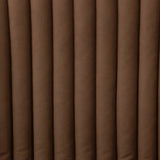 Elevate the office with one easy piece. Inspired by midcentury molded plywood chairs, brown oak veneer frames top-grain leather seat cushioning with slim, soft channeling. A 360-degree swivel burnished brass-finished base with casters allows for easy movement. Amethyst Home provides interior design, new home construction design consulting, vintage area rugs, and lighting in the Monterey metro area.