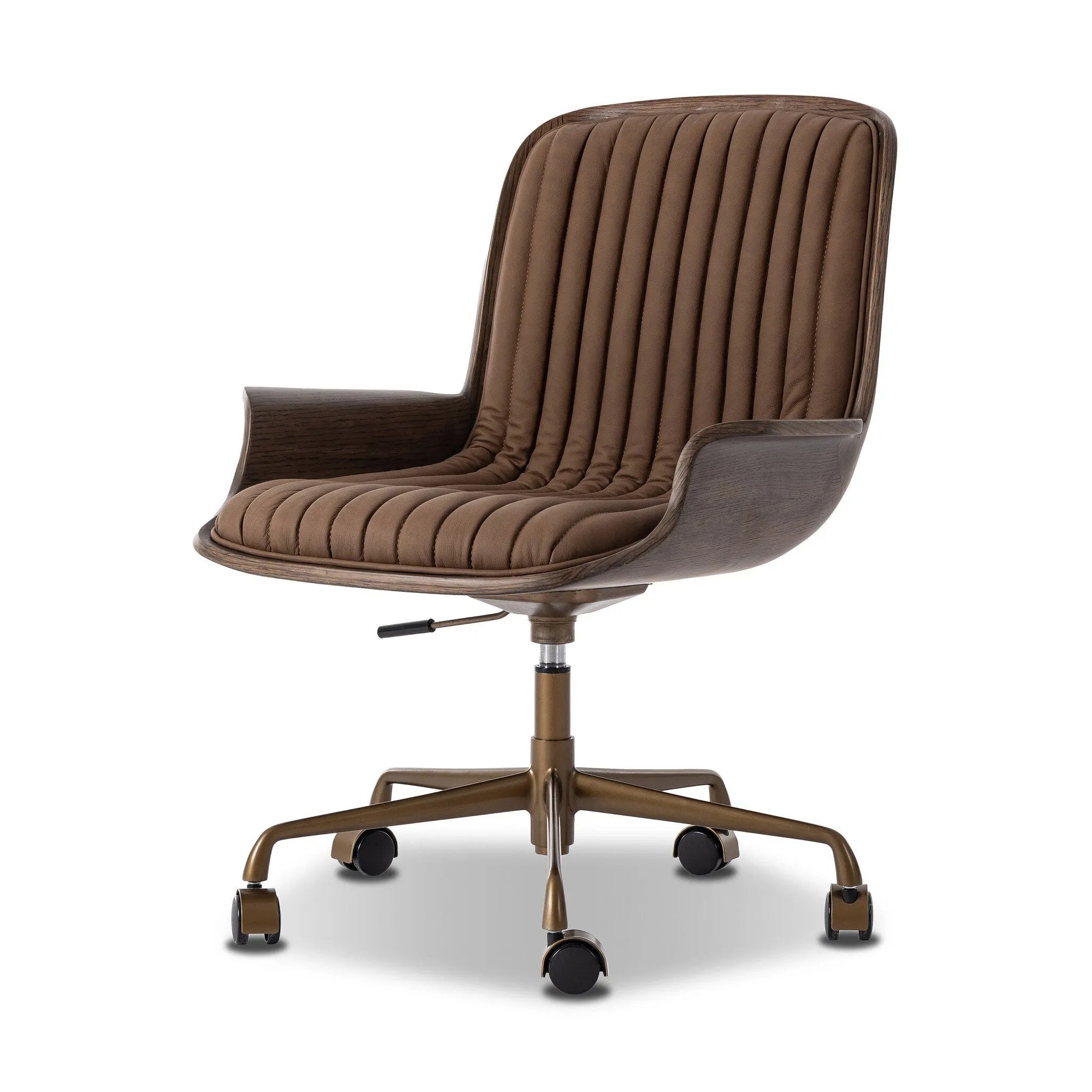 Elevate the office with one easy piece. Inspired by midcentury molded plywood chairs, brown oak veneer frames top-grain leather seat cushioning with slim, soft channeling. A 360-degree swivel burnished brass-finished base with casters allows for easy movement. Amethyst Home provides interior design, new home construction design consulting, vintage area rugs, and lighting in the Portland metro area.