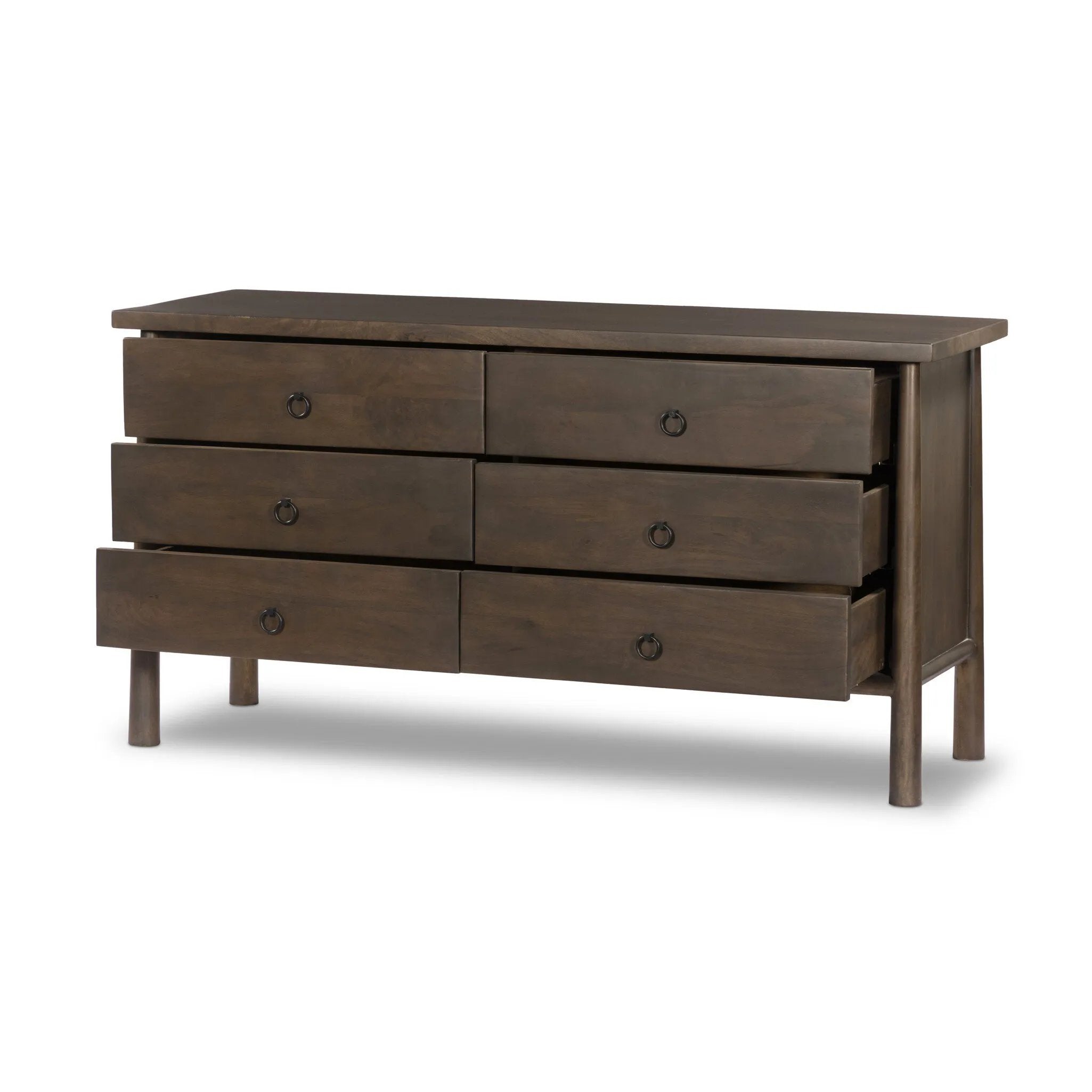 Inspired by French antique design, this dresser stands on round tapered legs with a prominent overhang top. Made of mango wood with cast iron key ring pulls, six drawers make it a versatile addition to the bedroom Amethyst Home provides interior design, new home construction design consulting, vintage area rugs, and lighting in the Tampa metro area.