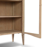 Traditional design defines this light-finished oak cabinet. Simple, clean side panels highlight a softly curved bottom frame. Steel handles in a copper patina finish add a unique touch.As fans of wabi sabi design at Amethyst, we love the nature inspired Gates Cabinet - Light Natural Oak Veneer. Amethyst Home provides interior design, new home construction design consulting, vintage area rugs, and lighting in the Calabasas metro area.