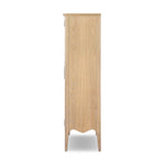 Traditional design defines this light-finished oak cabinet. Simple, clean side panels highlight a softly curved bottom frame. Steel handles in a copper patina finish add a unique touch.As fans of wabi sabi design at Amethyst, we love the nature inspired Gates Cabinet - Light Natural Oak Veneer. Amethyst Home provides interior design, new home construction design consulting, vintage area rugs, and lighting in the Houston metro area.