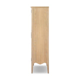 Traditional design defines this light-finished oak cabinet. Simple, clean side panels highlight a softly curved bottom frame. Steel handles in a copper patina finish add a unique touch.As fans of wabi sabi design at Amethyst, we love the nature inspired Gates Cabinet - Light Natural Oak Veneer. Amethyst Home provides interior design, new home construction design consulting, vintage area rugs, and lighting in the Houston metro area.