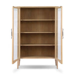 Traditional design defines this light-finished oak cabinet. Simple, clean side panels highlight a softly curved bottom frame. Steel handles in a copper patina finish add a unique touch.As fans of wabi sabi design at Amethyst, we love the nature inspired Gates Cabinet - Light Natural Oak Veneer. Amethyst Home provides interior design, new home construction design consulting, vintage area rugs, and lighting in the Miami metro area.