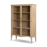 Traditional design defines this light-finished oak cabinet. Simple, clean side panels highlight a softly curved bottom frame. Steel handles in a copper patina finish add a unique touch.As fans of wabi sabi design at Amethyst, we love the nature inspired Gates Cabinet - Light Natural Oak Veneer. Amethyst Home provides interior design, new home construction design consulting, vintage area rugs, and lighting in the Washington metro area.