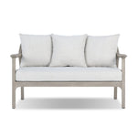 Dove-grey teak with a washed finish, linen-like upholstery and a braided woven seatback blend together for a monochromatic look on this outdoor sofa, perfect for small spaces. The slightly sun-aged look comes together for a style that evokes coastal vibes. Cover or store inside during inclement weather or when not in use. Amethyst Home provides interior design, new home construction design consulting, vintage area rugs, and lighting in the Newport Beach metro area.