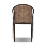 This outdoor dining chair takes inspiration from classic French bistro-style chairs, featuring a distinctive metal collar detail on the arms. The woven seatback comes together in a diamond pattern, finished with a cream-colored seat cushion. Cover or store inside during inclement weather and when not in use. Amethyst Home provides interior design, new home construction design consulting, vintage area rugs, and lighting in the Boston metro area.