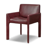 A bold dining chair design inspired by Italian modernism. Made from burgundy top-grain leather, with a wide format that contrasts slimmer chamfered legs leaving airiness underneath. The result: A beautiful balance of scale.As enthusiasts of luxe aesthetics at Amethyst, we love the warm modern inspired Graford Dining Chair - Dulane Burgundy. Amethyst Home provides interior design, new home construction design consulting, vintage area rugs, and lighting in the Laguna Beach metro area.