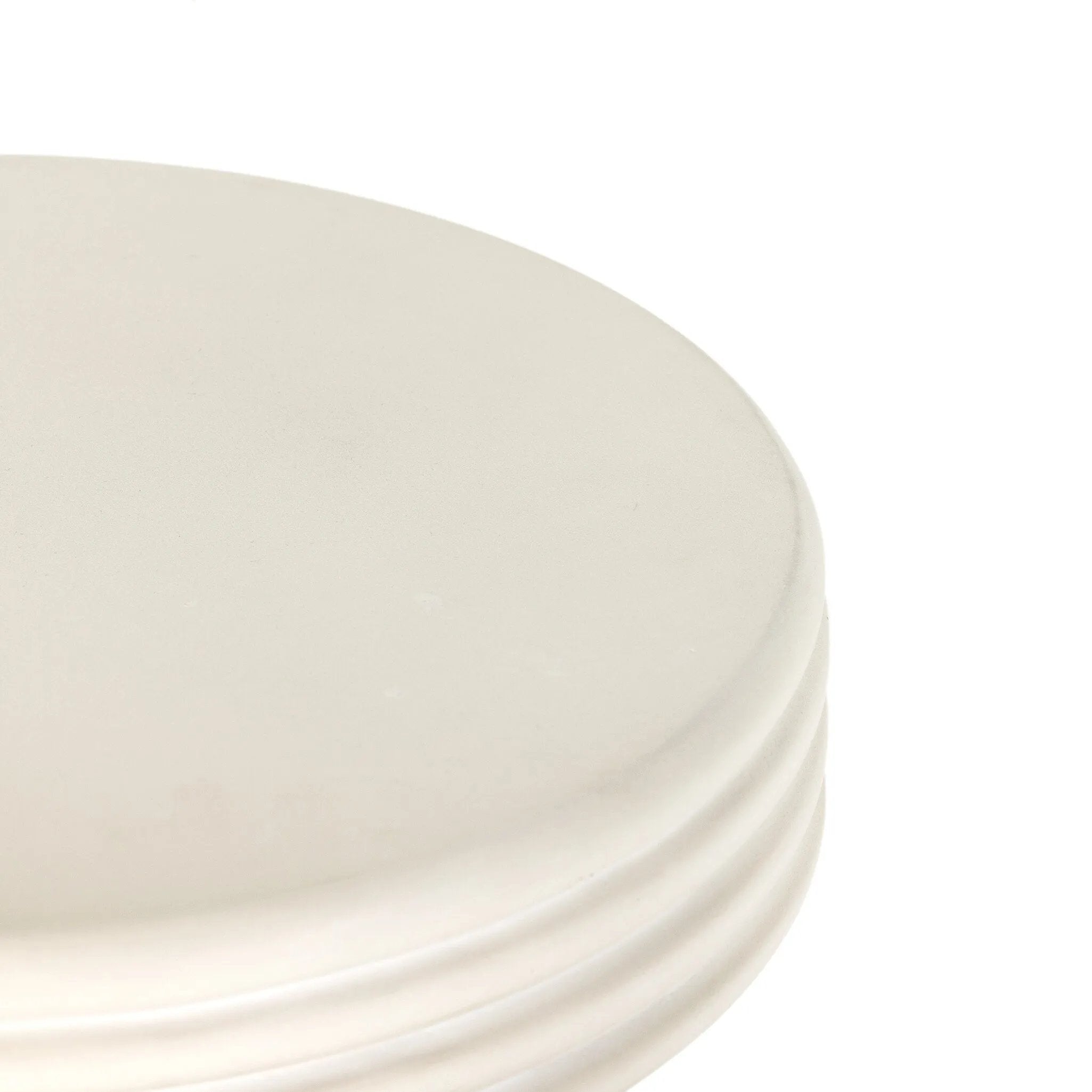 Statuesque and streamlined, an outdoor end table is crafted of smooth solid concrete and detailed with ribbed edging on top. Cover or store indoors during inclement weather and when not in use.As enthusiasts of wabi sabi design at Amethyst, we love the warm modern inspired Grecia Outdoor End Table. Amethyst Home provides interior design, new home construction design consulting, vintage area rugs, and lighting in the Laguna Beach metro area.