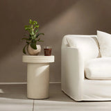 Statuesque and streamlined, an outdoor end table is crafted of smooth solid concrete and detailed with ribbed edging on top. Cover or store indoors during inclement weather and when not in use.As enthusiasts of wabi sabi design at Amethyst, we love the warm modern inspired Grecia Outdoor End Table. Amethyst Home provides interior design, new home construction design consulting, vintage area rugs, and lighting in the Monterey metro area.