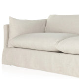 Featuring Habitat Bennett Moon Sofa by Four Hands at Amethyst Home. A slipcovered sofa made for modern living. Shelter arms and big, pillow-inspired cushions are covered in a durable comfortable fabric prime for lounging. Performance fabrics are specially created to withstand spills, stains, high traffic and wear, ensuring long-term comfort and unmatched du. Amethyst Home provides interior design, new home construction design consulting, vintage area rugs, and lighting in the Charlotte metro area.