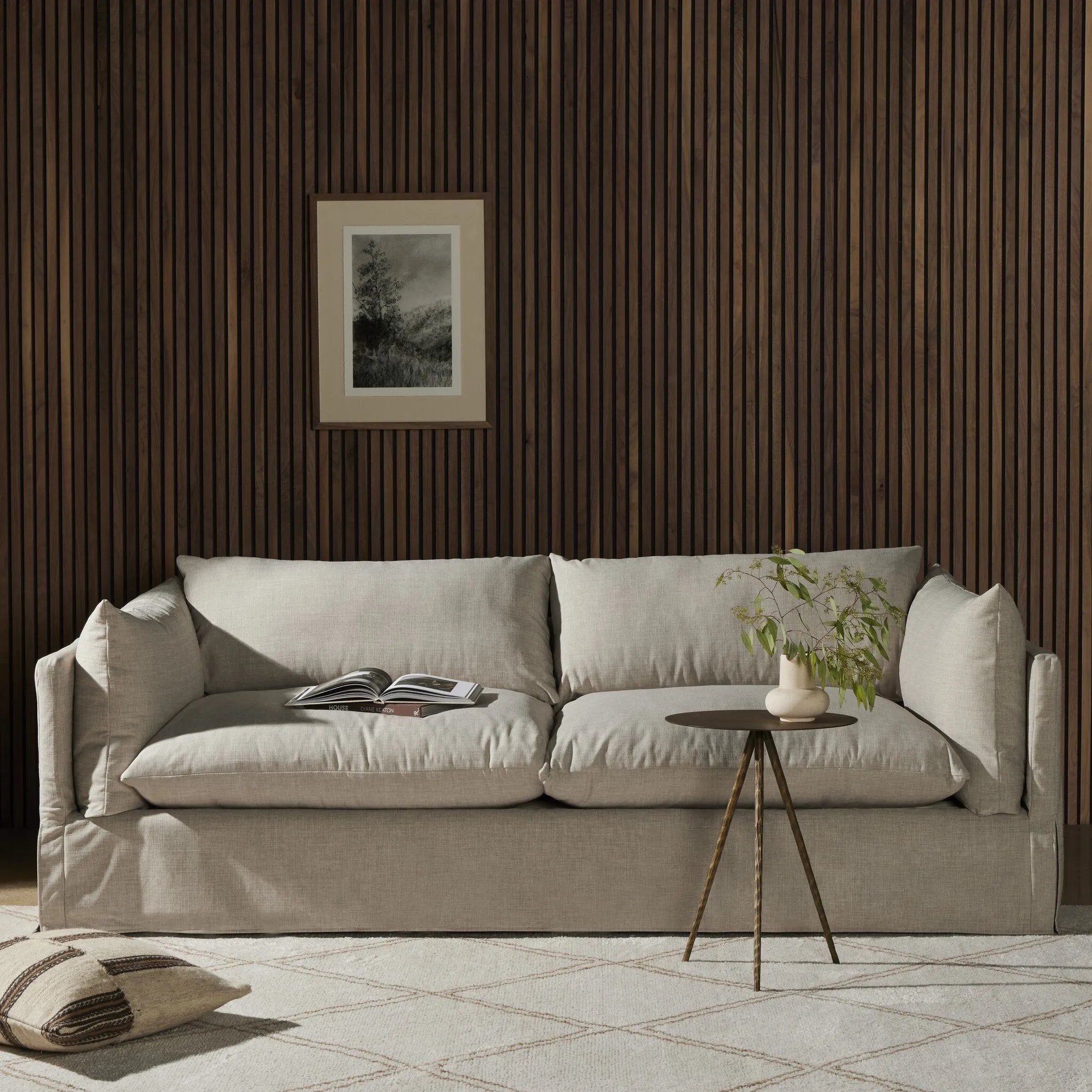 Featuring Habitat Bennett Moon Sofa by Four Hands at Amethyst Home. A slipcovered sofa made for modern living. Shelter arms and big, pillow-inspired cushions are covered in a durable comfortable fabric prime for lounging. Performance fabrics are specially created to withstand spills, stains, high traffic and wear, ensuring long-term comfort and unmatched . Amethyst Home provides interior design, new home construction design consulting, vintage area rugs, and lighting in the Los Angeles metro area.