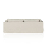 Featuring Habitat Bennett Moon Sofa by Four Hands at Amethyst Home. A slipcovered sofa made for modern living. Shelter arms and big, pillow-inspired cushions are covered in a durable comfortable fabric prime for lounging. Performance fabrics are specially created to withstand spills, stains, high traffic and wear, ensuring long-term comfort and unmatched dur. Amethyst Home provides interior design, new home construction design consulting, vintage area rugs, and lighting in the Portland metro area.