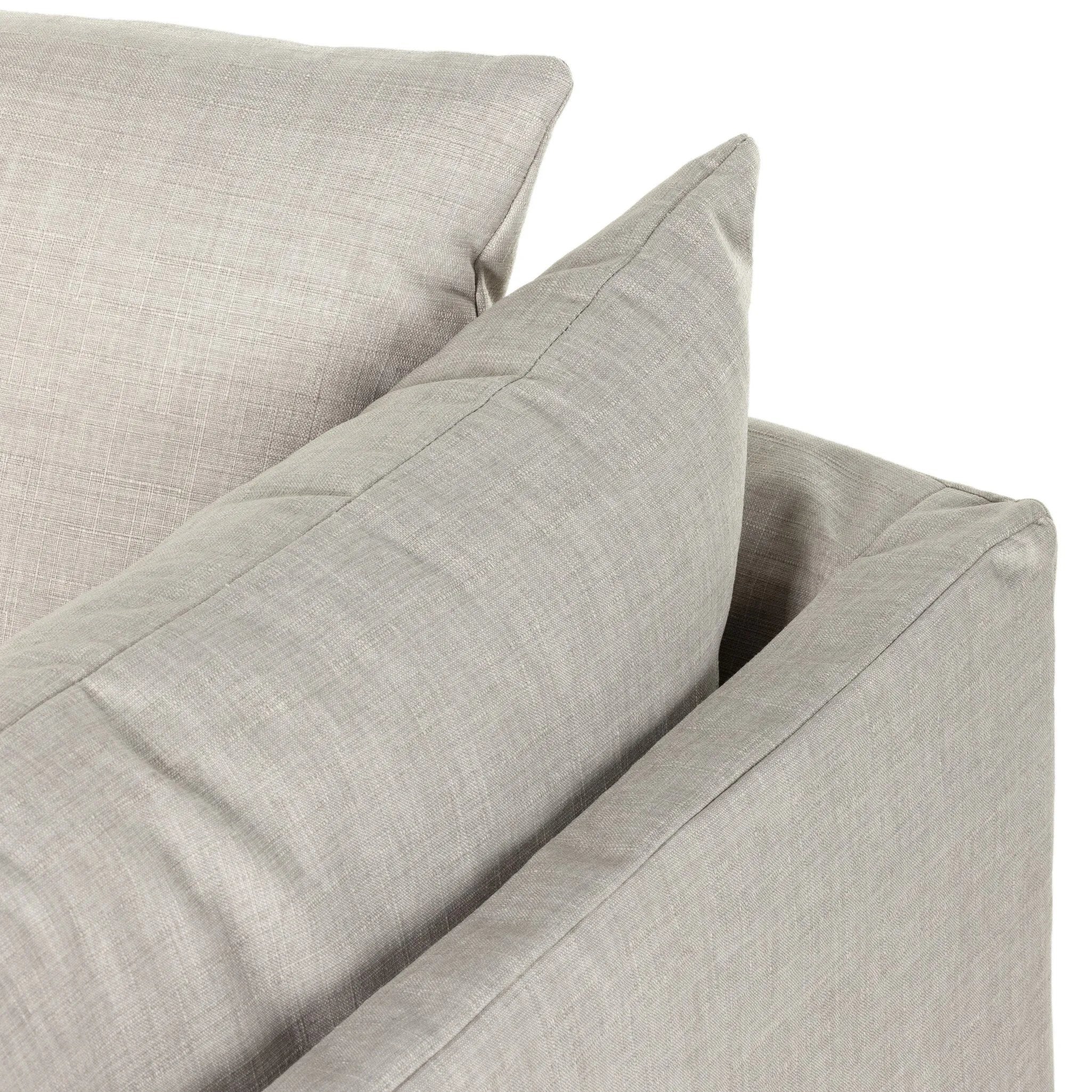 Featuring Habitat Bennett Moon Sofa by Four Hands at Amethyst Home. A slipcovered sofa made for modern living. Shelter arms and big, pillow-inspired cushions are covered in a durable comfortable fabric prime for lounging. Performance fabrics are specially created to withstand spills, stains, high traffic and wear, ensuring long-term comfort and unmatched dura. Amethyst Home provides interior design, new home construction design consulting, vintage area rugs, and lighting in the Seattle metro area.