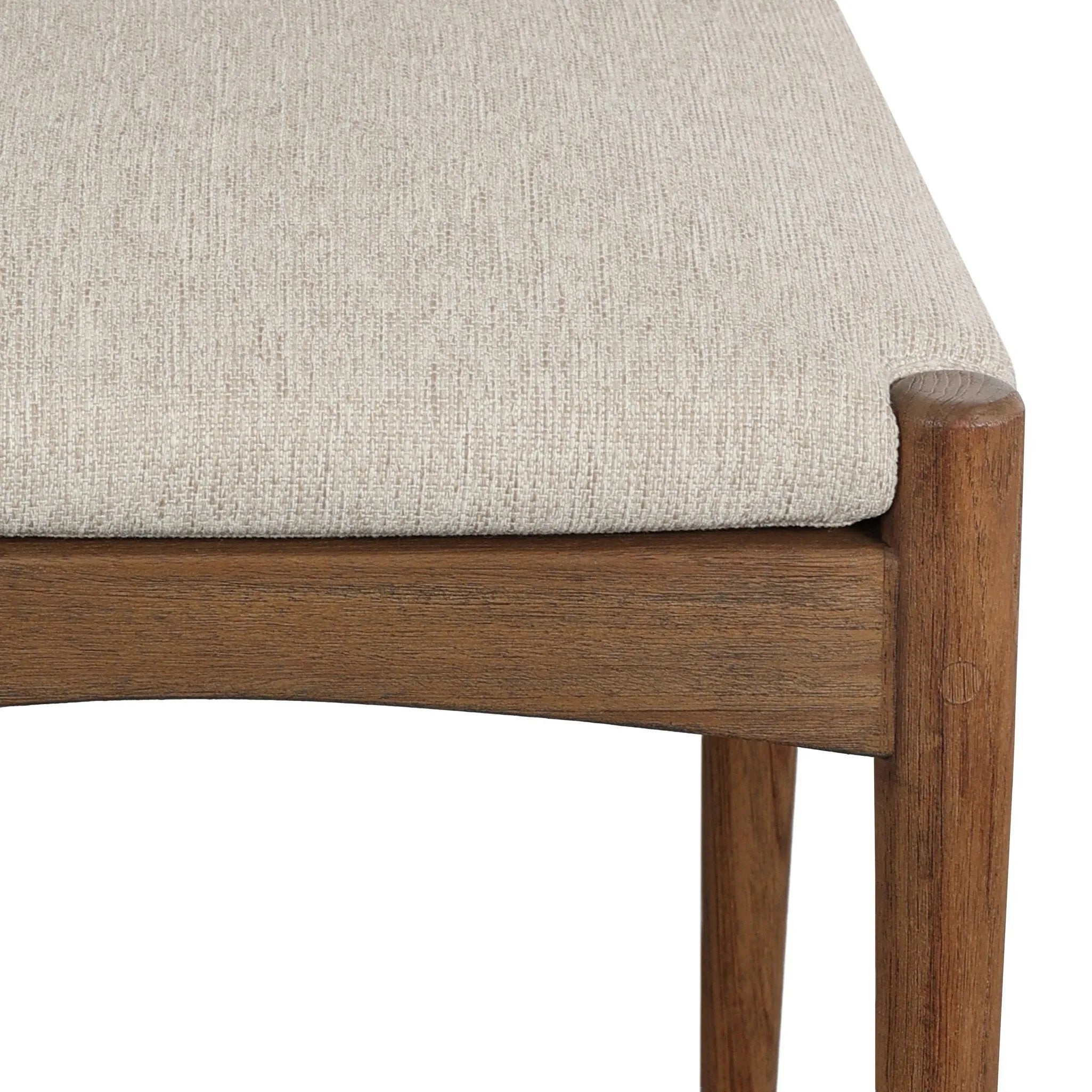 A curved back wrapped and textural woven paper cord take this everyday dining chair to new heights. FSC®-certified teak frames a tightly woven seat for a clean, monochromatic look. Cover or store inside during inclement weather and when not in use. Amethyst Home provides interior design, new home construction design consulting, vintage area rugs, and lighting in the Boston metro area.