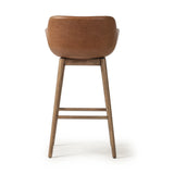 Featuring Hannah Sonoma Chestnut  Swivel Bar + Counter Stool by Four Hands at Amethyst Home. A midcentury-inspired counter stool gets refreshed with a modern memory swivel and chestnut top-grain leather. Slim, tapered oak legs balance a curved seat.BarOverall Dimensions: 21.75"w x 20.50"d x 40.75"hWeight: 23.81 lbsCounterOverall Dimensions: 21.75"w x 20.50"d x. Amethyst Home provides interior design, new home construction design consulting, vintage area rugs, and lighting in the Austin metro area.