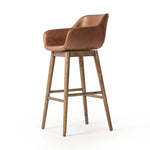 Featuring Hannah Sonoma Chestnut  Swivel Bar + Counter Stool by Four Hands at Amethyst Home. A midcentury-inspired counter stool gets refreshed with a modern memory swivel and chestnut top-grain leather. Slim, tapered oak legs balance a curved seat.BarOverall Dimensions: 21.75"w x 20.50"d x 40.75"hWeight: 23.81 lbsCounterOverall Dimensions: 21.75"w x 20.50"d x. Amethyst Home provides interior design, new home construction design consulting, vintage area rugs, and lighting in the Boston metro area.