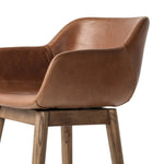 Featuring Hannah Sonoma Chestnut  Swivel Bar + Counter Stool by Four Hands at Amethyst Home. A midcentury-inspired counter stool gets refreshed with a modern memory swivel and chestnut top-grain leather. Slim, tapered oak legs balance a curved seat.BarOverall Dimensions: 21.75"w x 20.50"d x 40.75"hWeight: 23.81 lbsCounterOverall Dimensions: 21.75"w x 20.50". Amethyst Home provides interior design, new home construction design consulting, vintage area rugs, and lighting in the Calabasas metro area.