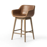 Featuring Hannah Sonoma Chestnut Swivel Counter Stool by Four Hands at Amethyst Home. Experience the ultimate in comfort and style with the Hannah Sonoma Chestnut Swivel Bar + Counter Stool. Featuring a durable and sleek design, this stool offers maximum support and functionality. With its smooth swivel motion, you can easily reach for things around you, ma. Amethyst Home provides interior design, new home construction design consulting, vintage area rugs, and lighting in the Charlotte metro area.