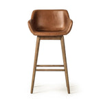 Featuring Hannah Sonoma Chestnut  Swivel Bar + Counter Stool by Four Hands at Amethyst Home. A midcentury-inspired counter stool gets refreshed with a modern memory swivel and chestnut top-grain leather. Slim, tapered oak legs balance a curved seat.BarOverall Dimensions: 21.75"w x 20.50"d x 40.75"hWeight: 23.81 lbsCounterOverall Dimensions: 21.75"w x 20.50"d x . Amethyst Home provides interior design, new home construction design consulting, vintage area rugs, and lighting in the Omaha metro area.