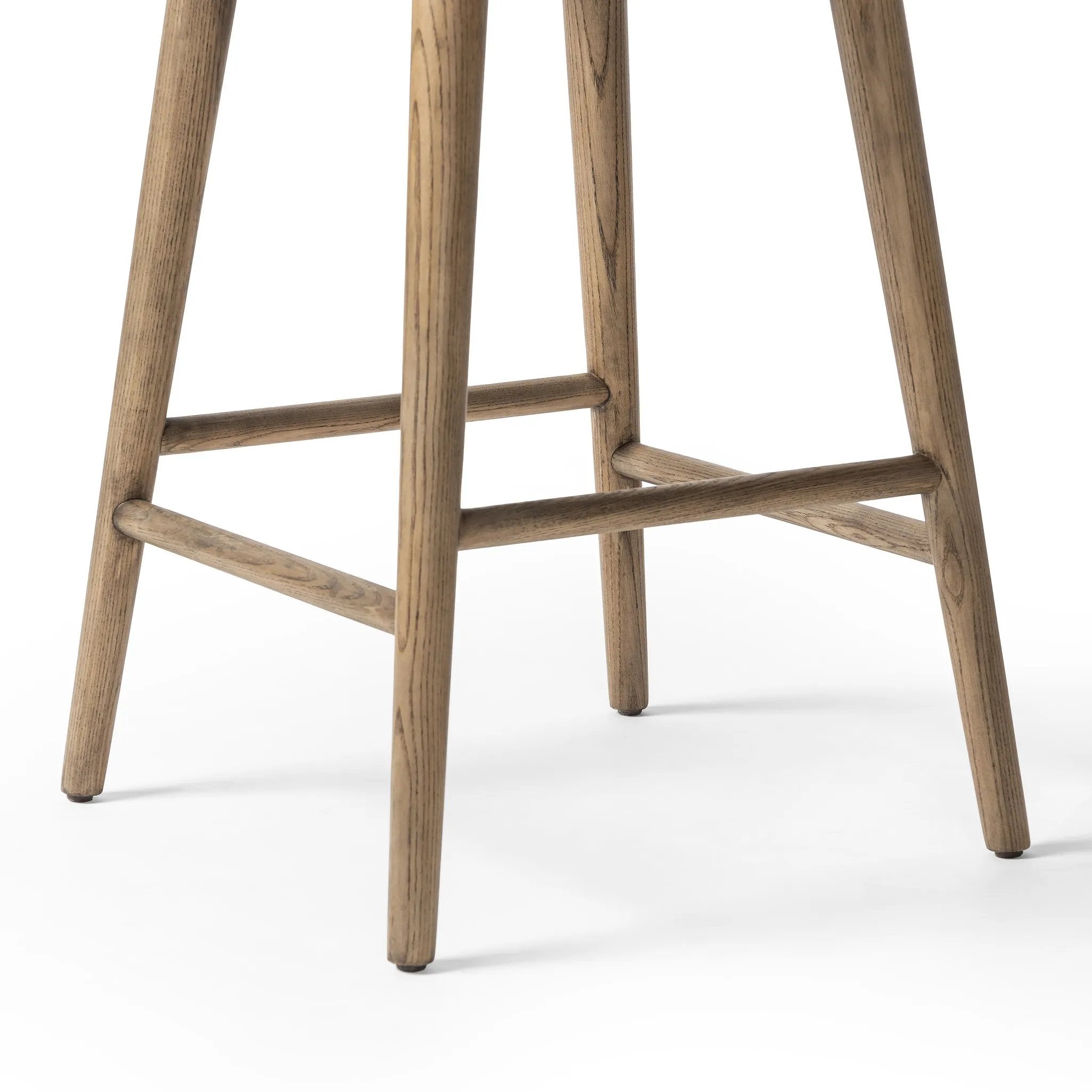 Featuring Hannah Sonoma Chestnut  Swivel Bar + Counter Stool by Four Hands at Amethyst Home. A midcentury-inspired counter stool gets refreshed with a modern memory swivel and chestnut top-grain leather. Slim, tapered oak legs balance a curved seat.BarOverall Dimensions: 21.75"w x 20.50"d x 40.75"hWeight: 23.81 lbsCounterOverall Dimensions: 21.75"w x 20.50"d. Amethyst Home provides interior design, new home construction design consulting, vintage area rugs, and lighting in the Portland metro area.