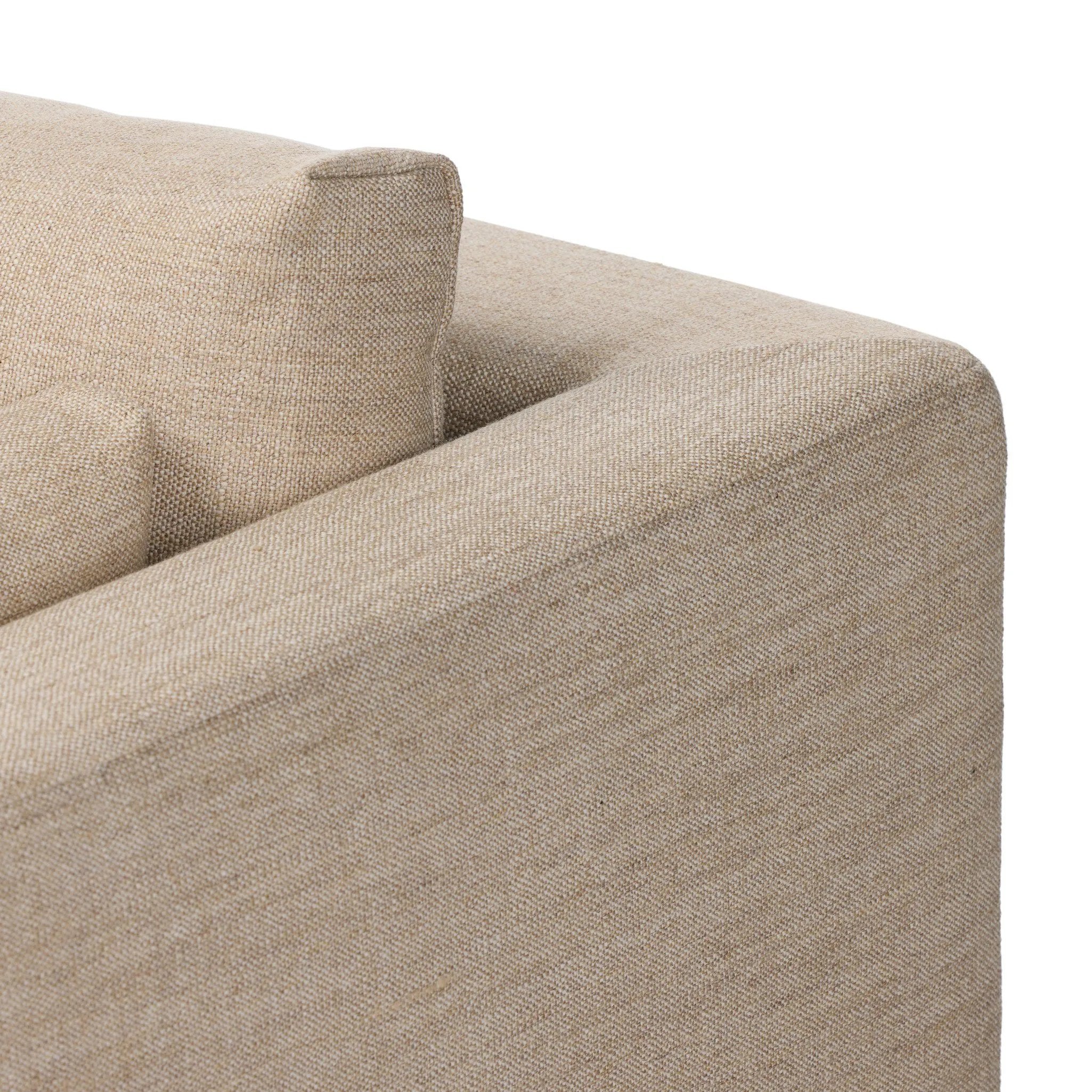 With traditional details like turned oak legs and brass casters, this low-profile accent chair features an elongated bench seat for an inviting sit. Performance fabric in neutral wheat finishes a knife-edge back and boxed arm cushions Amethyst Home provides interior design, new home construction design consulting, vintage area rugs, and lighting in the Newport Beach metro area.