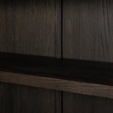 With rounded sides inspired by Eighties design, almond-finished oak brings depth into any room in your home. Spacious shelves create endless storage and display options for favorite books and keepsakes, all visible through clear tempered glass Amethyst Home provides interior design, new home construction design consulting, vintage area rugs, and lighting in the Dallas metro area.