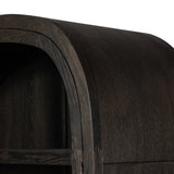 With rounded sides inspired by Eighties design, almond-finished oak brings depth into any room in your home. Spacious shelves create endless storage and display options for favorite books and keepsakes, all visible through clear tempered glass Amethyst Home provides interior design, new home construction design consulting, vintage area rugs, and lighting in the Laguna Beach metro area.