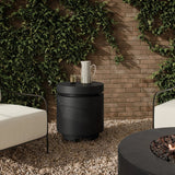 This outdoor propane tank enclosure pairs with fire tables for a clean, seamless look. Made from glass-reinforced concrete, each piece is naturally finished with deep tones of charcoal. It can act as an end table with its lid on, and has cutouts at the base for hose attachments. Cover or store indoors during inclement weather and when not in use. Amethyst Home provides interior design, new home construction design consulting, vintage area rugs, and lighting in the Omaha metro area.