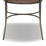 A light, airy take on the traditional bistro shape. This outdoor dining chair features exaggerated splayed legs and a curved X-shaped stretcher, with a handle detail cut out of the woven seat back. Finished with a seat cushion. Cover or store indoors during inclement weather and when not in use. Amethyst Home provides interior design, new home construction design consulting, vintage area rugs, and lighting in the Park City metro area.