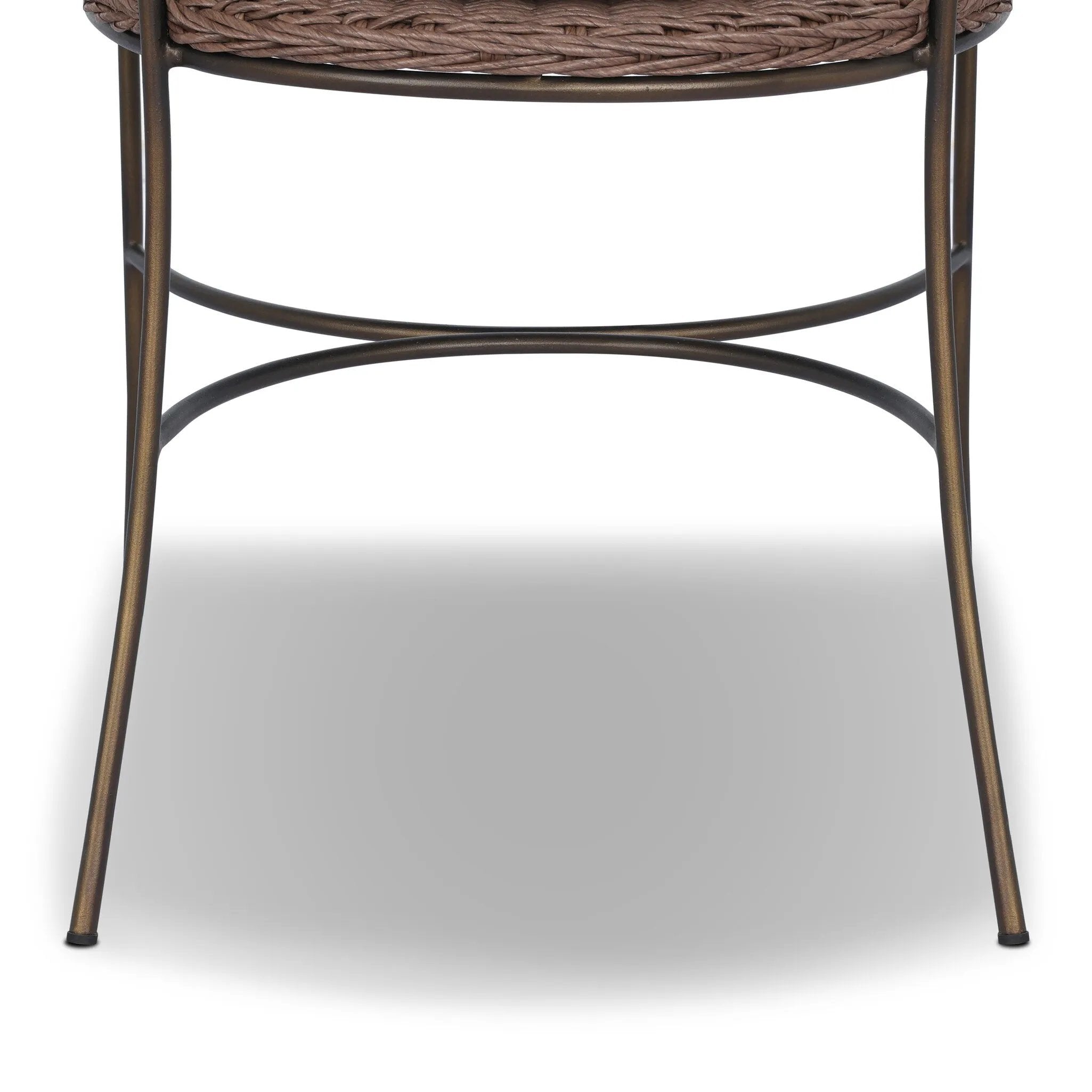 A light, airy take on the traditional bistro shape. This outdoor dining chair features exaggerated splayed legs and a curved X-shaped stretcher, with a handle detail cut out of the woven seat back. Finished with a seat cushion. Cover or store indoors during inclement weather and when not in use. Amethyst Home provides interior design, new home construction design consulting, vintage area rugs, and lighting in the Park City metro area.