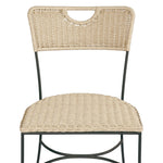 A light, airy take on the traditional bistro shape. This outdoor dining chair features exaggerated splayed legs and a curved X-shaped stretcher, with a handle detail cut out of the woven seat back. Finished with a seat cushion. Cover or store indoors during inclement weather and when not in use. Amethyst Home provides interior design, new home construction design consulting, vintage area rugs, and lighting in the Austin metro area.