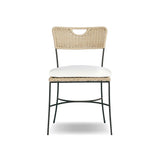 A light, airy take on the traditional bistro shape. This outdoor dining chair features exaggerated splayed legs and a curved X-shaped stretcher, with a handle detail cut out of the woven seat back. Finished with a seat cushion. Cover or store indoors during inclement weather and when not in use. Amethyst Home provides interior design, new home construction design consulting, vintage area rugs, and lighting in the Kansas City metro area.