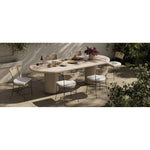A light, airy take on the traditional bistro shape. This outdoor dining chair features exaggerated splayed legs and a curved X-shaped stretcher, with a handle detail cut out of the woven seat back. Finished with a seat cushion. Cover or store indoors during inclement weather and when not in use. Amethyst Home provides interior design, new home construction design consulting, vintage area rugs, and lighting in the Portland metro area.