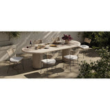 A light, airy take on the traditional bistro shape. This outdoor dining chair features exaggerated splayed legs and a curved X-shaped stretcher, with a handle detail cut out of the woven seat back. Finished with a seat cushion. Cover or store indoors during inclement weather and when not in use. Amethyst Home provides interior design, new home construction design consulting, vintage area rugs, and lighting in the Portland metro area.
