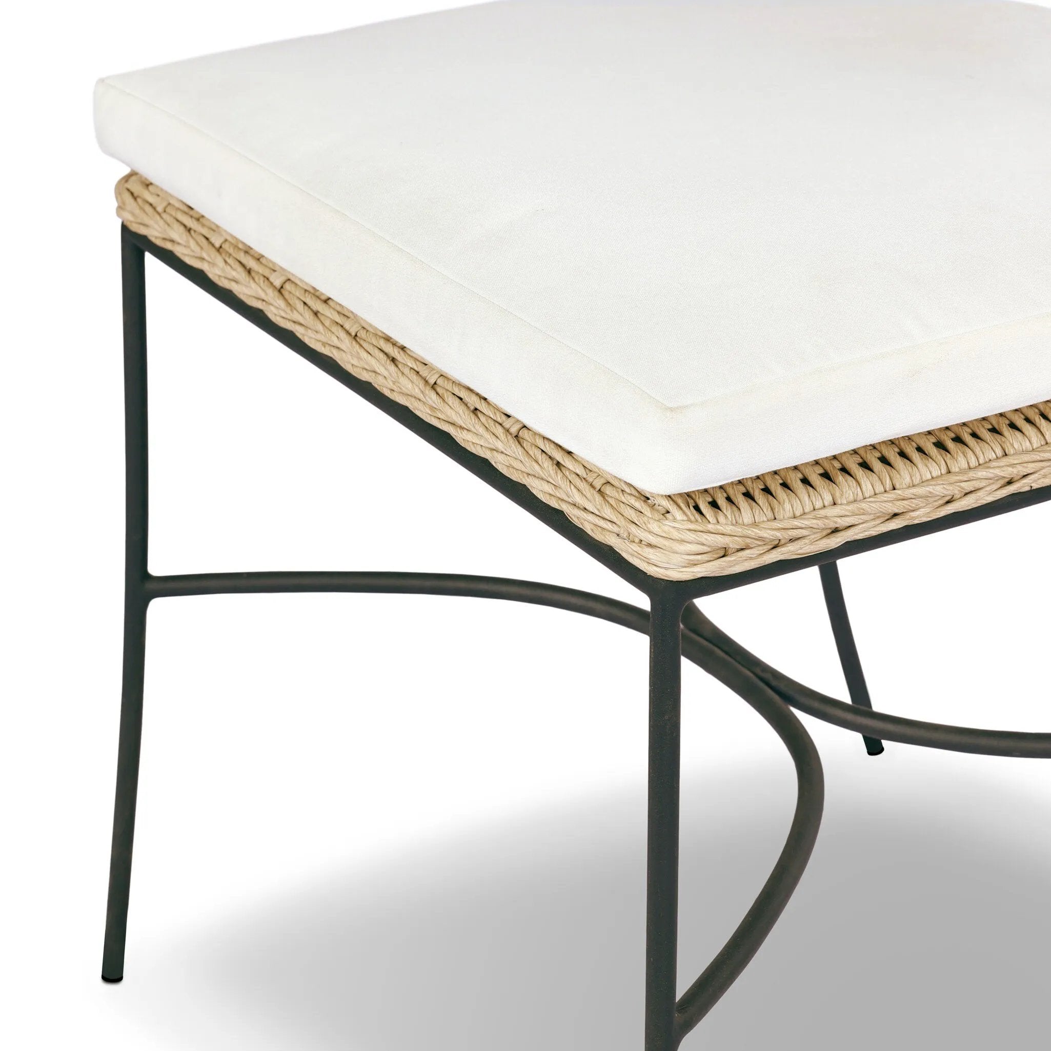 A light, airy take on the traditional bistro shape. This outdoor dining chair features exaggerated splayed legs and a curved X-shaped stretcher, with a handle detail cut out of the woven seat back. Finished with a seat cushion. Cover or store indoors during inclement weather and when not in use. Amethyst Home provides interior design, new home construction design consulting, vintage area rugs, and lighting in the Salt Lake City metro area.