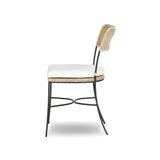 A light, airy take on the traditional bistro shape. This outdoor dining chair features exaggerated splayed legs and a curved X-shaped stretcher, with a handle detail cut out of the woven seat back. Finished with a seat cushion. Cover or store indoors during inclement weather and when not in use. Amethyst Home provides interior design, new home construction design consulting, vintage area rugs, and lighting in the Winter Garden metro area.