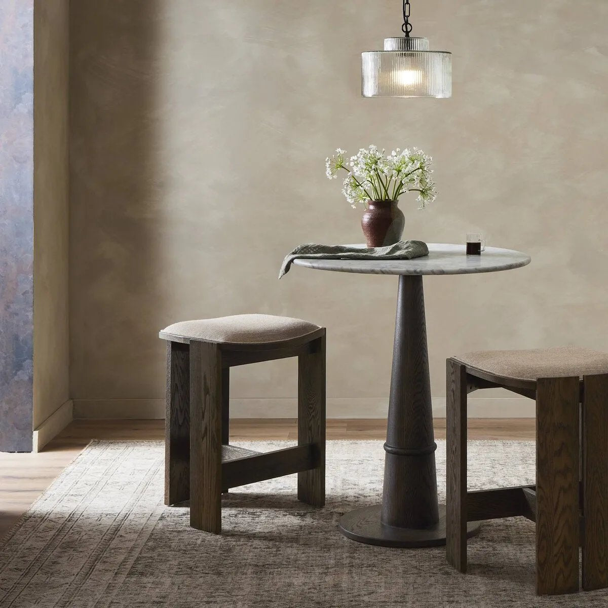 Featuring Hoven Alcala Fawn Backless Bar Stool by Four Hands at Amethyst Home. Expertly crafted from durable materials, the Hoven Alcala Fawn Backless Bar Stool is the perfect addition to any bar or kitchen counter. Its sleek and modern design offers both style and comfort, making it ideal for entertaining guests or enjoying a meal.
Overall Dimensions: 18. Amethyst Home provides interior design, new home construction design consulting, vintage area rugs, and lighting in the Kansas City metro area.