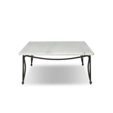 Inspired by Art Deco designs, this outdoor coffee table introduces a sense of movement to a classic silhouette. Graceful, flowing lines on the base pair with a white marble top for a classic black-and-white look. Cover or store inside during inclement weather and when not in use. Amethyst Home provides interior design, new home construction design consulting, vintage area rugs, and lighting in the Boston metro area.